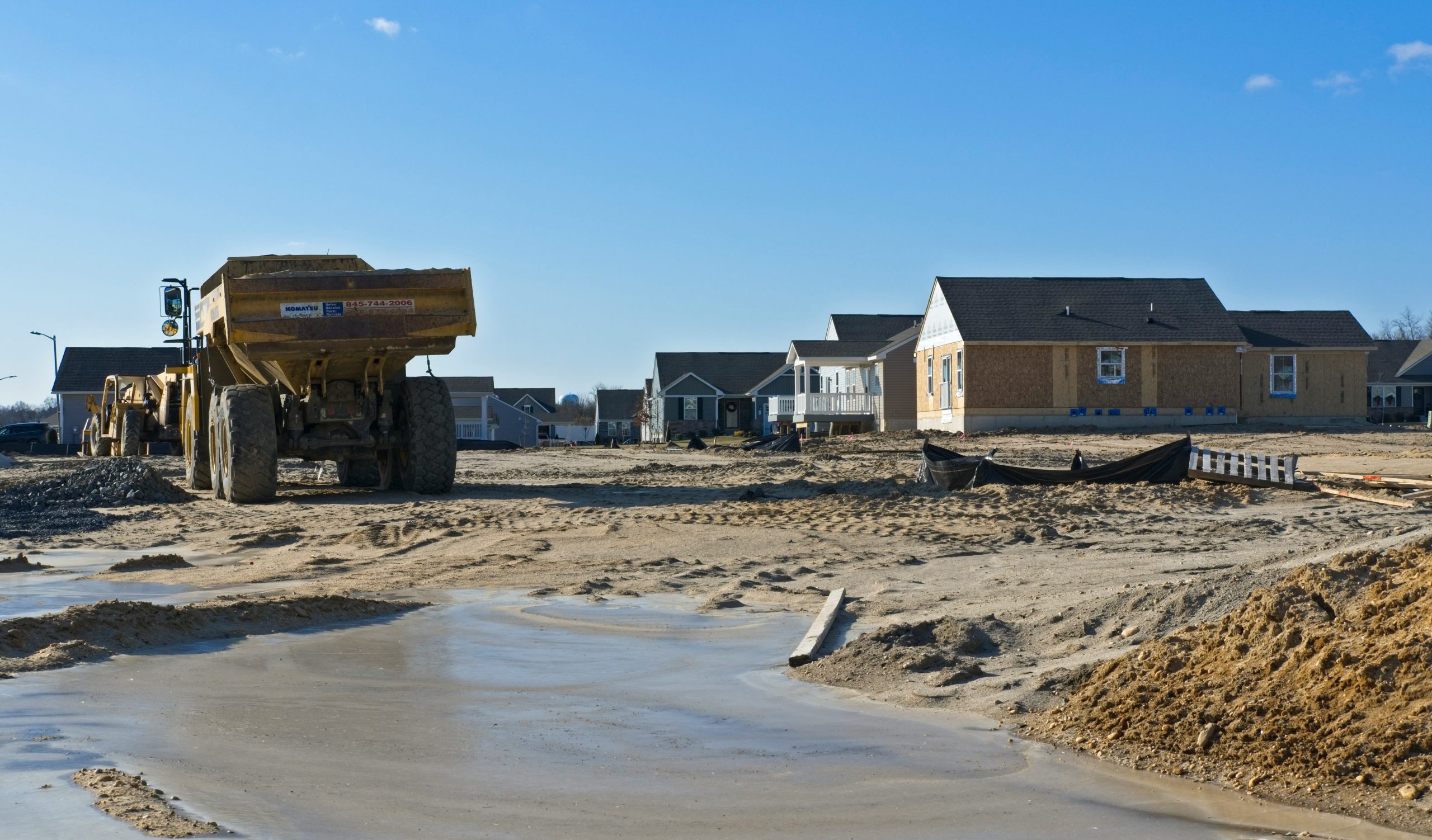 build vs buy. new home construction